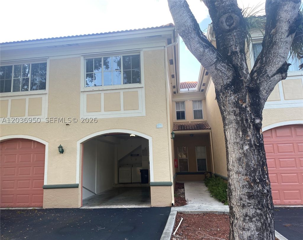 Photo of 2492 Centergate Dr #102, Miramar, FL 33025 (MLS # A12036950)