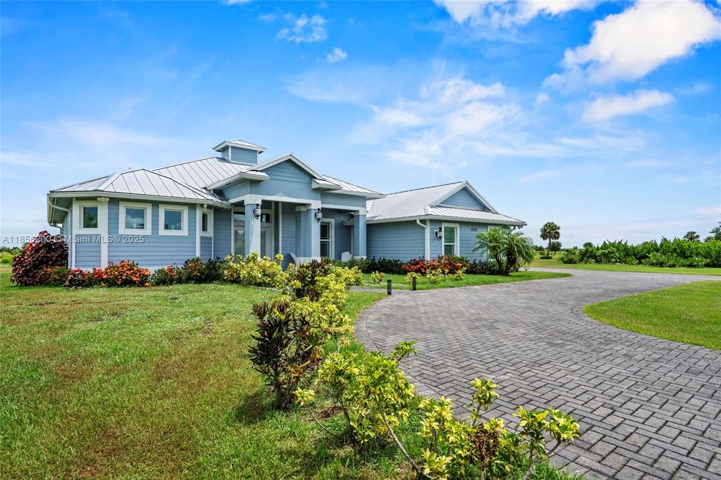 Photo of 15350 Navion Dr, Port St Lucie, FL 34987 (MLS # A11856200)