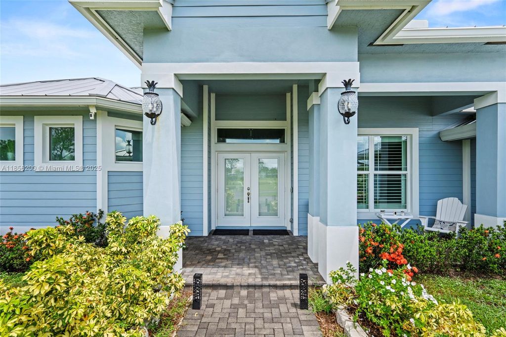 Photo of 15350 Navion Dr, Port St Lucie, FL 34987 (MLS # A11856200)