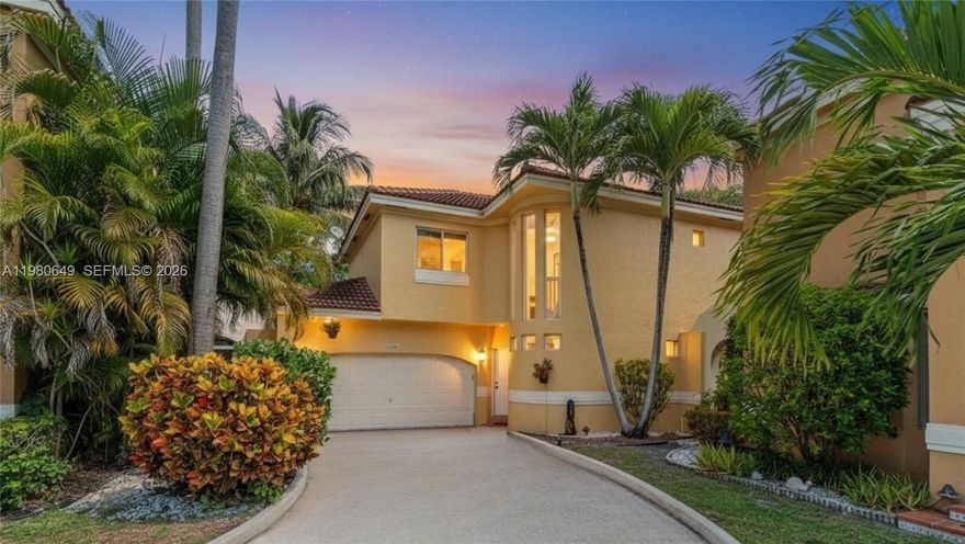 Beautifully maintained lakefront residence located in the desirable Portofino Condominium community. The home features 4 bed 2.5 baths, approx. 2,000SF of bright light-filled living area with an open and airy floor plan enhanced by abundant natural light and laminate flooring throughout the home. The spacious layout flows seamlessly into the modern kitchen, featuring granite countertops and stainless steel appliances. An elegant staircase serves as a beautiful architectural focal point, framed by three soaring windows that fill the home with natural light and lead gracefully to the second level. The large primary suite offers a peaceful lake view, a large walk-in closet, and an updated bathroom. The large wrap-around screened patio overlooks a stunning lake view, creating a peaceful outdoor setting surrounded by mature trees and lush landscaping that provide exceptional privacy. The property also features a large driveway and a two-car garage. Portofino Condominium offers low-maintenance living with HOA fees covering the roof, landscaping, utilities, and more. Residents enjoy access to community amenities, including a pool, clubhouse, BBQ area, and children’s playground.