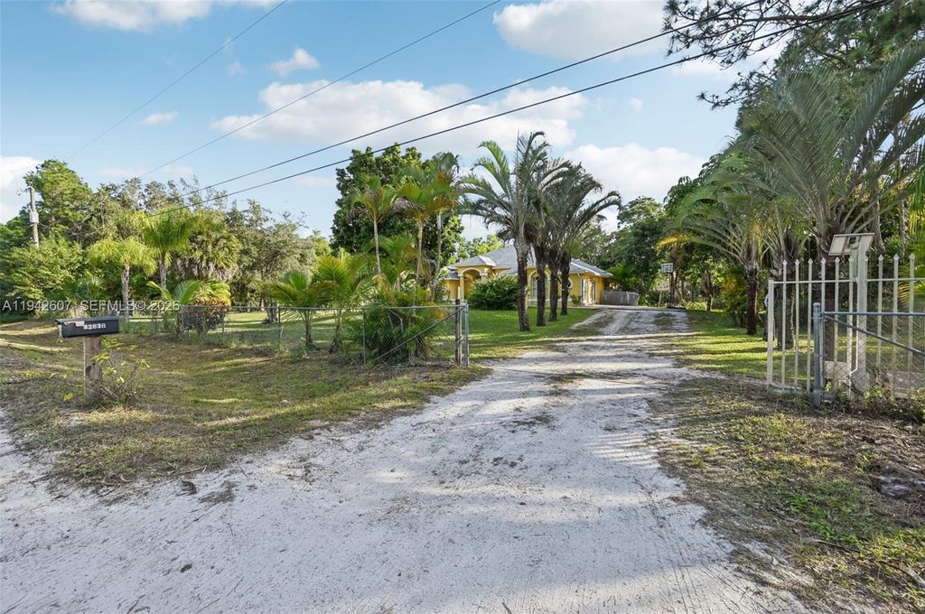 Photo of 12878 N 77th Pl N, West Palm Beach, FL 33412 (MLS # A11942607)