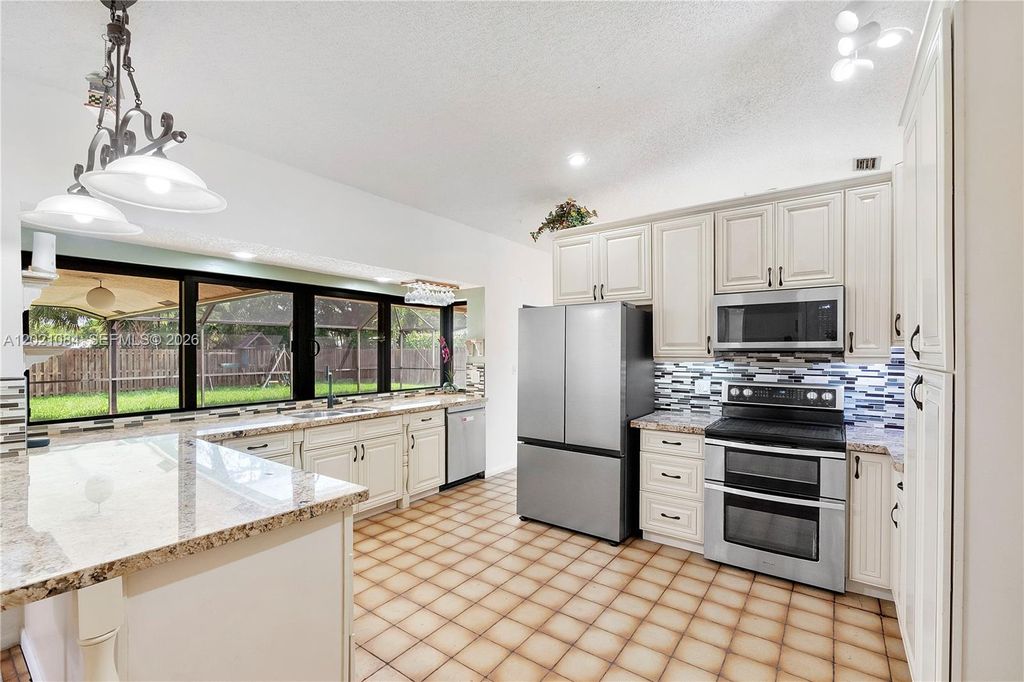 Photo of 11111 NW 7th St, Coral Springs, FL 33071 (MLS # A12021084)