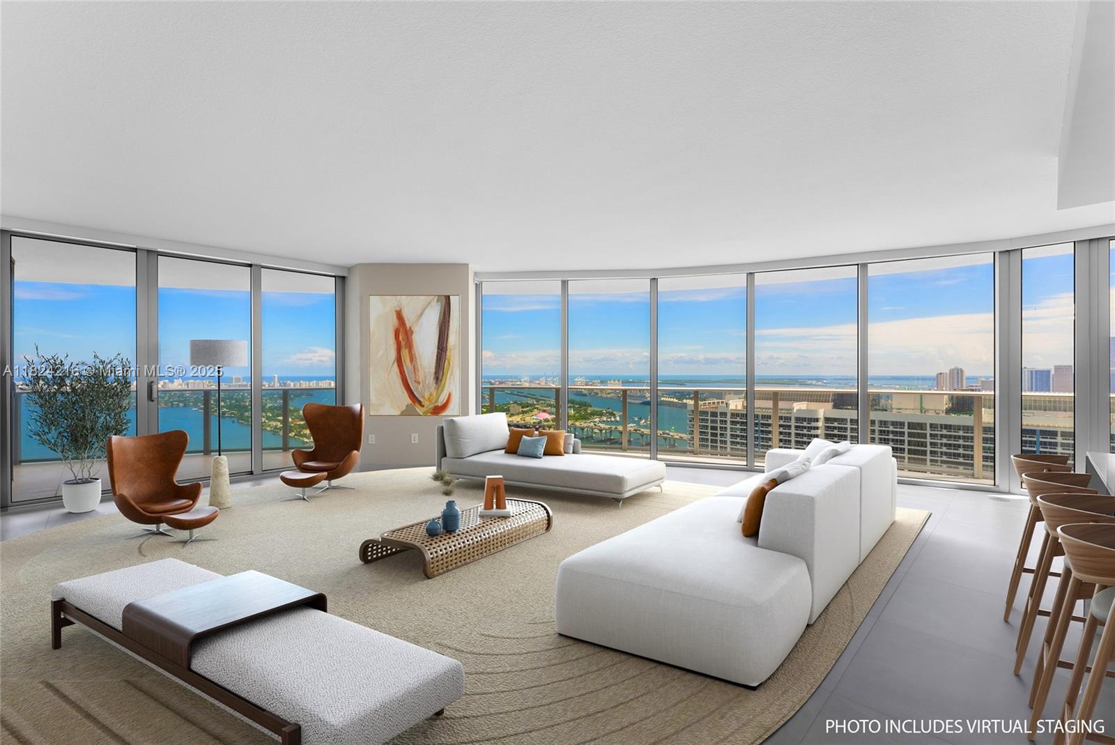 Fabulous 3BR/4BA Southeast corner unit on the 41st floor at Aria On The Bay offers a full wrap-around terrace and spectacular panoramic views over the open bay, city and ocean. Sip your coffee while watching the sunrise over Miami Beach, Fisher Island & beyond and enjoy cocktails and dinner with stunning sunset views over the city. Porcelain floors and electric shades throughout, marble baths and sleek open chef’s kitchen with quartz countertops and top-of-the-line stainless steel appliances. All the closets have been outfitted with built-ins. A full service building with great amenities in one of Miami’s most desirable locations close to shopping, dining, The Design District, Brickell, Miami Beach and Miami International airport. Just furnish it with your taste and make it
your home.