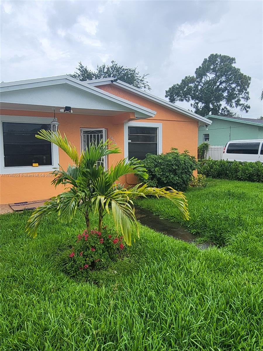 Great investment opportunity awaiting the right investor! Located on a nice quiet street in Miami Gardens just a few blocks from the turnpike, the Hard Rock Stadium. Lots of avocado, mango and coconut trees on the land. Current combined rents total $4800 per month. Zoned for 2-9 units - opportunity to develop.
