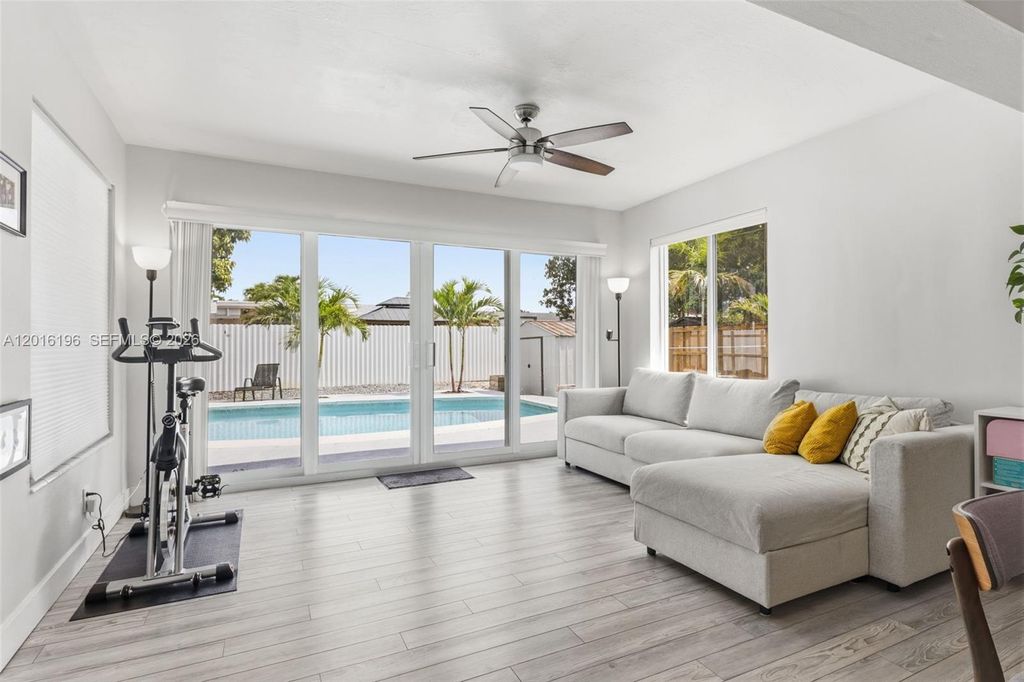 Photo of 8451 NW 16th St, Pembroke Pines, FL 33024 (MLS # A12016196)