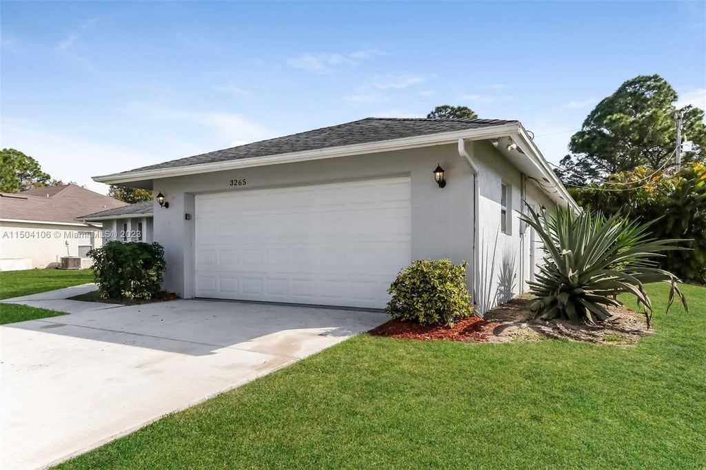 Photo of 3265 SW Escarole St, Port Saint Lucie, FL 34953 (MLS # A11504106)
