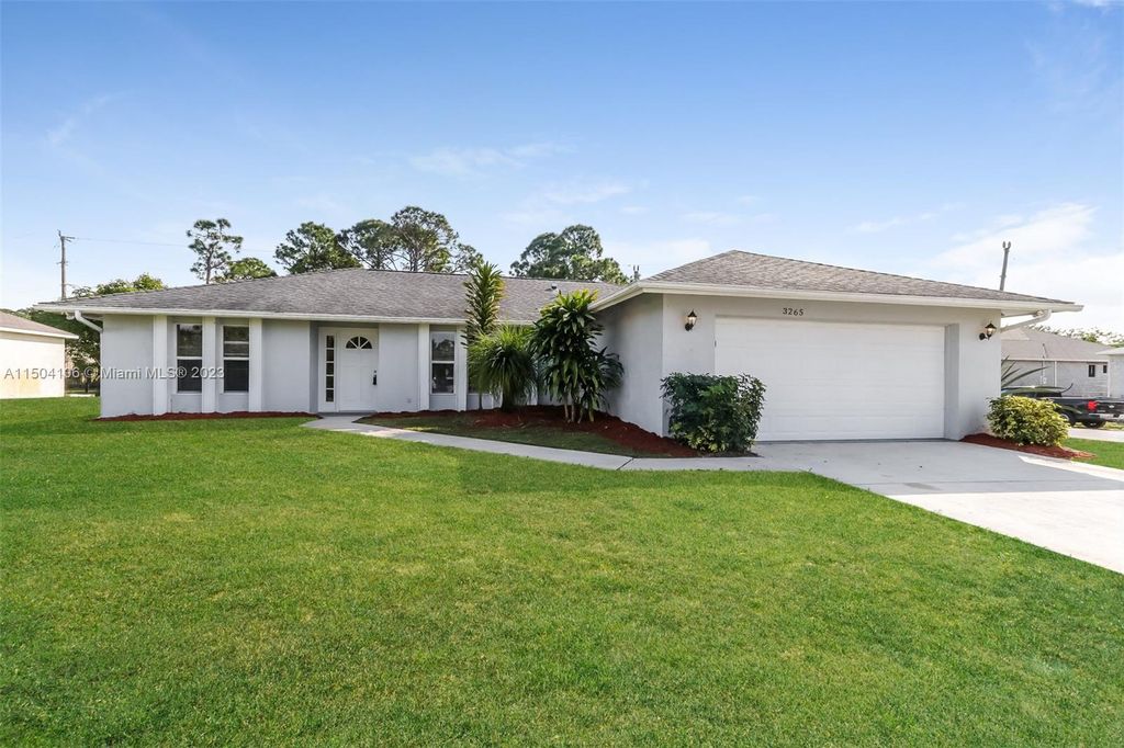 Photo of 3265 SW Escarole St, Port Saint Lucie, FL 34953 (MLS # A11504106)