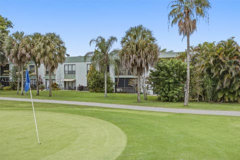 Photo of 4054 N Pine Island Rd #2B, Sunrise, FL 33351 (MLS # A12060507)