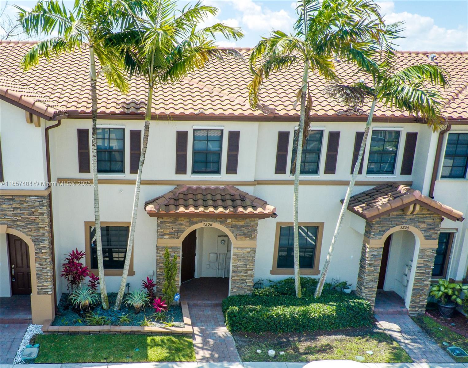 Welcome to this beautiful 3 Bed, 2.5 Baths townhome located in Martinique! This home features high ceilings and an open-layout concept. The large eat-in kitchen and the back patio space are perfect for entertaining guests. Brand new Laminate floors were just placed upstairs. All bedrooms have large closets and the utility room in the patio allows for even more storage space. Washer & Dryer are upstairs as well. Living in Martinique, you'll have access to amazing amenities such as the community clubhouse, gym, child play area and community pool.This home is also located close to plenty of shopping centers, great restaurants,Turnpike and Hospital.