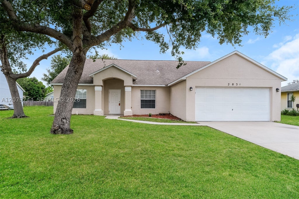 Photo of 2831 Hutchings Ave, Port St Lucie, FL 34952 (MLS # A12079744)