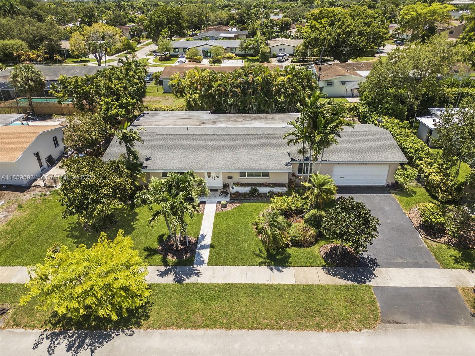 Beautiful Ranch- Style Residential Home located in the desirable neighborhood of Kendall Point. Private Street. Close to Baptist Hospital, Dadeland Mall, "A" Schools (public and private) and minutes to expressways.
Perfect lay out with 4 beds 2 full baths (master bedroom has a walking closet) Title/wood Floors throughout (2 bedrooms have laminated wood floors).
Spacious remodeled kitchen with island and stainless steel appliances. The family room opens onto the covered patio - screened in- and to the garden. It's ideal for enjoying outdoor living and the swimming pool.
Bathrooms have been substantially updated. The covered garage has space for 1 car and includes the W&D. Rent includes pool and landscaping maintenance and pest control.
Alarm system ready to be setup. Impact Windows