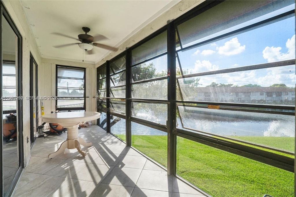 Photo of 9606 W Mcnab Rd #202, Tamarac, FL 33321 (MLS # A11981259)