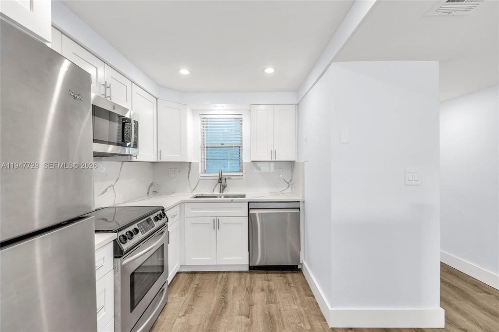 Photo of 3100 W Rolling Hills Cir #109, Davie, FL 33328 (MLS # A11947729)