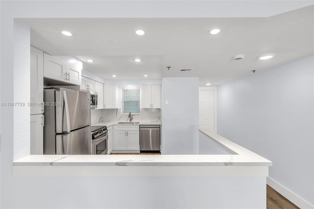 Photo of 3100 W Rolling Hills Cir #109, Davie, FL 33328 (MLS # A11947729)