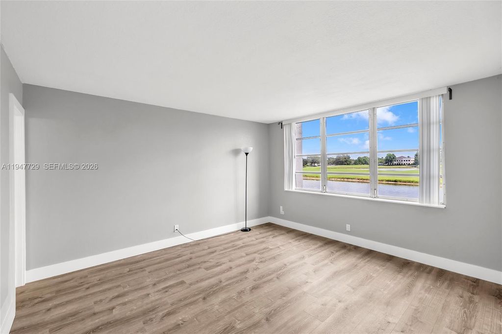 Photo of 3100 W Rolling Hills Cir #109, Davie, FL 33328 (MLS # A11947729)