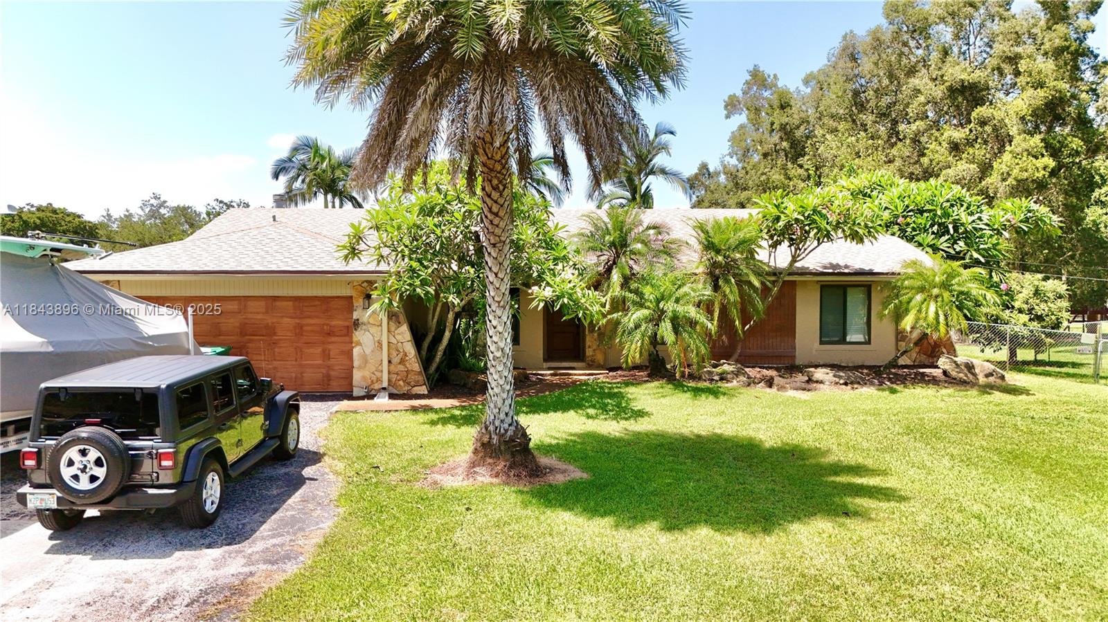 Rare Opportunity in Cooper City – 4BR/3BA Pool Home on Builder's Acre. Welcome to your private oasis in the heart of Cooper City! Nestled on a spacious builder’s acre. Enjoy the serenity of your own tropical retreat, complete with a sparkling pool, lush landscaping, fruit trees and ample space to expand, entertain, or simply relax in total privacy. This rare property offers a peaceful setting tucked away from the hustle, yet is just minutes from top-rated schools, parks, HardRock guitar, shopping, dining, and major highways. Whether you're looking for room to grow, space to entertain, or a place to unwind, this Cooper City gem has it all. No HOA. Room for RV/boat storage, future guest house, or custom additions. Call today for appointment.