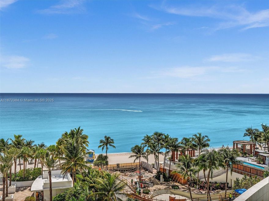 Unit comes with THREE assigned parking spaces!! This oceanfront gem boasts direct, unobstructed views of the Atlantic Ocean, the Intracoastal Waterway, and the vibrant city skyline from expansive floor-to-ceiling windows and private balconies. Step into elegance with private elevator access leading to a grand double-door entry, high 9-foot ceilings, marble flooring, and designer finishes throughout. The gourmet kitchen features granite countertops, premium Sub-Zero and Wolf appliances, while the spa-like master suite offers a whirlpool tub, dual walk-in closets, and serene vistas. Additional highlights include impact-resistant windows, recessed lighting, energy-efficient systems, and in-unit laundry.