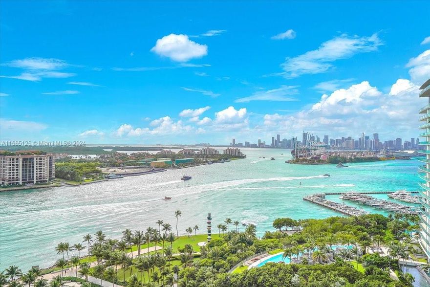 An exceptionally rare opportunity to purchase a coveted & top-selling "02" line residence in the iconic Portofino Tower in the exclusive South of Fifth neighborhood. Perched at the perfect elevation on the 19th floor & showcasing special flow through architecture, floor-to-ceiling windows, custom built-ins in living area & den, extended eat-in kitchen island & electric window treatments throughout. #1902 captures unparalleled views from every vantage point: To the East, the morning sunrise shimmers over the sparkling turquoise Atlantic Ocean & to the West, witness awe-inspiring & explosive sunsets over the majestic Biscayne Bay, Cruise Ship channel, lush Fisher Island & vibrant Miami skyline as the sky becomes a pastel real-life painting & the city lights glimmer & come to life at twilight