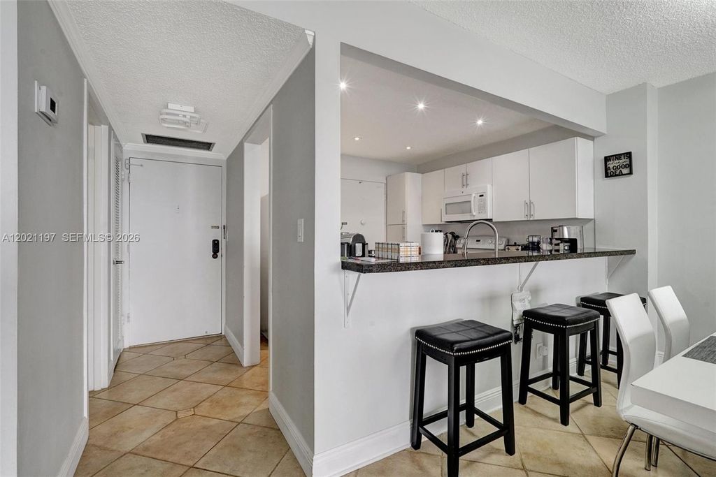 Photo of 3725 S Ocean Dr #812, Hollywood, FL 33019 (MLS # A12021197)