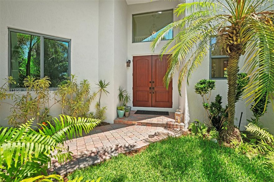 Beautiful lush tropical oasis surrounds this 5/3.5 home w/guest house & 2 car garage. This rare model courtyard home is located in the Groves at Old Cutler gated community. Nicely maintained 2-story home has new roof, impact windows & doors, and updated bathrooms. Main living room with a grand staircase & 19ft high ceiling has lots of natural light. XL primary suite has sitting area, 2 walk-in closets, lg walk-in shower w/tub, double vanities & water closet. Large balcony off the primary w/spiral staircase leads to the lush backyard w/ covered patio, concrete slab for boat/RV, many fruit trees & room for a pool. Charming guest house w/ full bath, walk-in closet & terrace can be used as office/gym. Large yard is great for entertaining. Welcome to your new home!