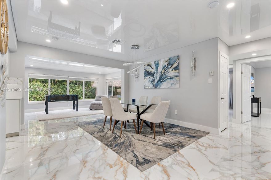 Beautifully furnished and renovated home featuring 3 bedrooms, 3 bathrooms, and a spacious family room. This bright, open-layout home offers hurricane-impact windows and doors, tile and wood floors, and gas appliances, including a generator. Enjoy an oversized backyard with a private pool and covered patio—perfect for outdoor living. Centrally located near top schools, shopping, dining, entertainment, and just minutes from the beach.