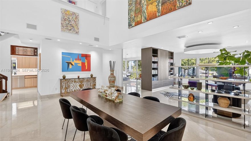 Experience a tranquil and secure lifestyle at L’Hermitage, located in Coconut Grove on Biscayne Bay within a gated community just a few steps from the Grove’s vibrant lifestyle. Only 10 residences sit directly on the bay, yet this villa offers expansive water and pool views among the remaining 65 units, with a rare unobstructed sightline to the bay that most buyers never expect outside the bayfront tier. Every inch has been thoughtfully enhanced. Beautifully updated kitchen with high-end appliances and Taj Mahal quartz countertops. All four bathrooms are tastefully updated in a clean, modern design. This residence features 3 en-suite bedrooms. The primary suite includes a steam shower and Jacuzzi. 48x48 marble floors throughout, impact windows and doors, high ceilings, and light-filled living spaces. Roof approx. 3 years old and both AC systems replaced within the past 4 years. Finished garage and 6 total parking spaces. Enjoy resort-style living with winding walkways through manicured gardens leading to the waterfront pool and dock, 2 clay tennis courts. Exceptional walkability to nearby parks and Coconut Grove along the waterfront. Minutes to Downtown, Key Biscayne, the beaches, and Brickell.