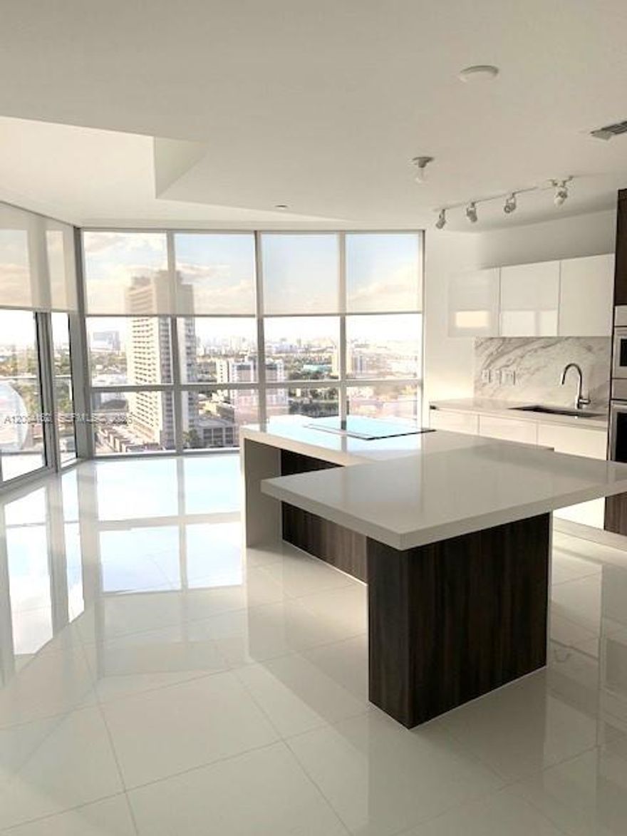 State of the art Building. 1 Bed, convertible DEN and two full bathrooms. Unit has private elevator with foyer. European kitchen appliances. Built-in closets, porcelain floors, floor to ceiling windows, automatic blinds, ample balcony with access from living room and bedroom. Master bedroom with bathtub, double sink and closet. Amenities: Sky Deck, Basketball, and Racquetball court, 5 swimming pools, Yoga Studio, gym and boxing area. Virtual golf, recording studio, kids play and BBQ.