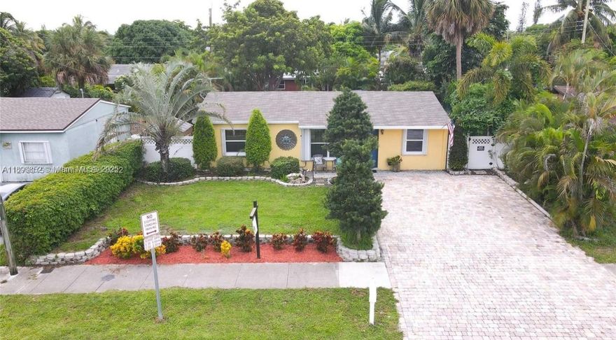 This charming 3-bedroom, 1-bathroom home offers a beautifully renovated kitchen, a roof less than five years old, and impact-resistant doors and windows for peace of mind. Enjoy energy efficiency with a tankless water heater and relax in the spacious backyard—perfect for entertaining or quiet evenings outdoors. Located in a friendly, well-established neighborhood with no HOA restrictions, this property combines comfort, convenience, and freedom.