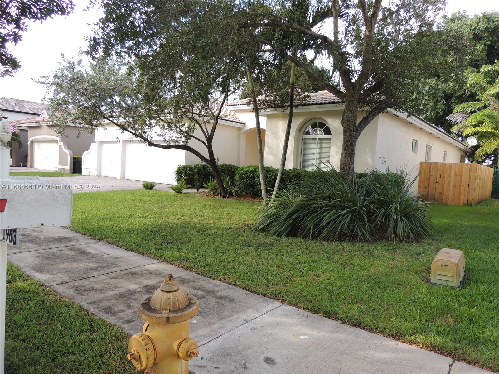 Beautiful 4 bedroom. 3bathroom, 3 car garage Estate Home in the highly sought after neighborhood of Palm Isle Estates in the Fairways. This lovely split plan home has wood floors and tile flooring in the kitchen and bathrooms, a cozy nook in the kitchen for breakfast, counter bar, cooking Isle and a butlers pantry. Large master bedroom with an on suite and sitting area. The Master Association has 6 tennis courts, handball court, racquet ball court, bocce ball court and pickleball courts. The neighborhood is close to the turnpike, shops, schools restaurants and hospital.
Association fee includes basic cable, internet, alarm monitoring, security gate and rooving patrol.
