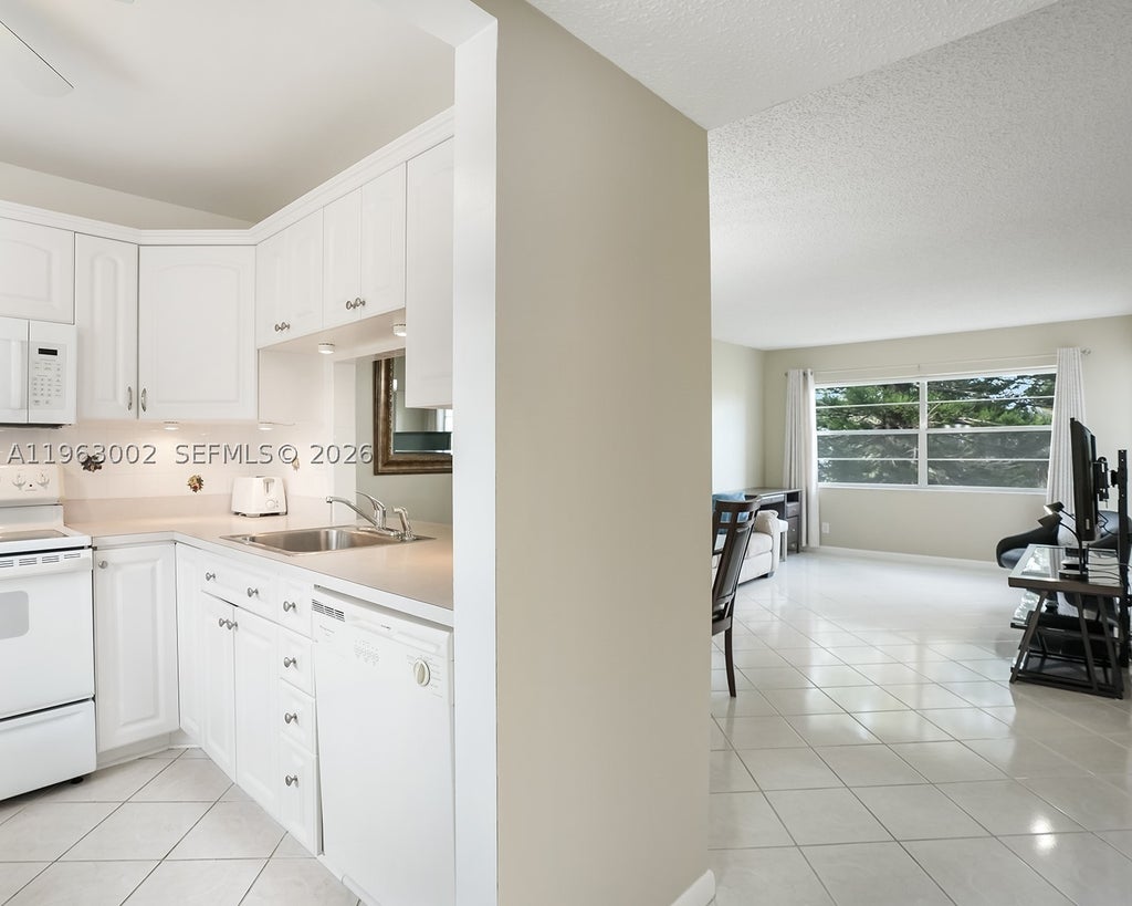 Photo of 4805 NW 35th St #506, Lauderdale Lakes, FL 33319 (MLS # A11963002)