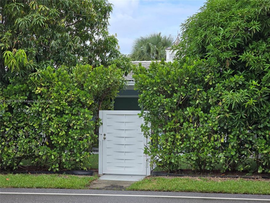 Cozy beach escape in dive-perfect location with all the extras - from surfboards & bikes to games & beach towels. Fully remodeled mid-century modern 2 bed, 1 bath with beautiful terrazzo floors, impact windows & doors, and a complete set of blackout shades ideal for a true R&R getaway. Walk 3 blocks to Singer Island's restaurants & shops or walk 5 short blocks to Sailfish Marina to catch a ferry to Peanut Island. The property has only 2 units, each with its own outdoor grill and semi-private patio separated by a metal privacy fence. Washer & dryer available in outdoor closet accessible to all tenants. Furnishings include 2 queen beds, 1 L shape leather couch that sleeps 2 adults, a day bed and pullout twin trundle. Portable crib available upon request. Parking for 4 vehicles. Dogs welcome.