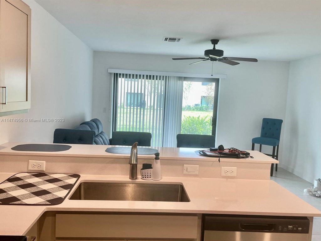 Photo of 5032 Genove Pl, Riviera Beach, FL 33410 (MLS # A11474956)