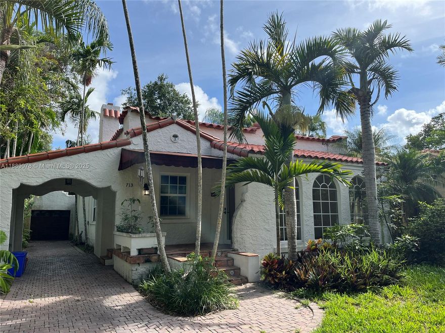 A Beautiful Old Spanish House with character and charm. Top Coral Gables location in the prestigious Platinum Triangle neighborhood. Close to the best private schools in the city and zoned to Sunset Elementary (one of the best Public Schools). The house features a spacious formal living and dining room, wood-burning fireplace, hardwood floors, breakfast area, impact windows, landscaped backyard, detached garage and covered carport.  Ideal for a family or professional looking for one of the best and quiet areas in Miami.