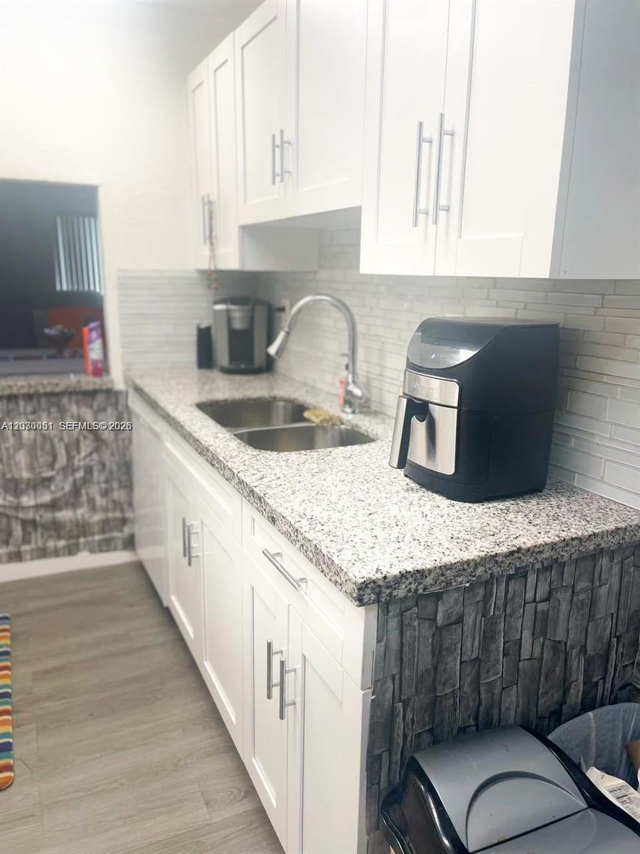 Photo of 177 Lakeview Dr #104, Weston, FL 33326 (MLS # A12030051)