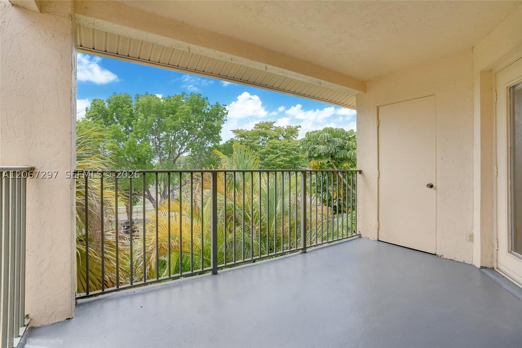 Photo of 9999 Summerbreeze Dr #409, Sunrise, FL 33322 (MLS # A12067297)