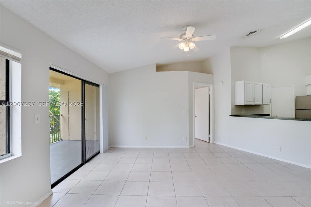 Photo of 9999 Summerbreeze Dr #409, Sunrise, FL 33322 (MLS # A12067297)