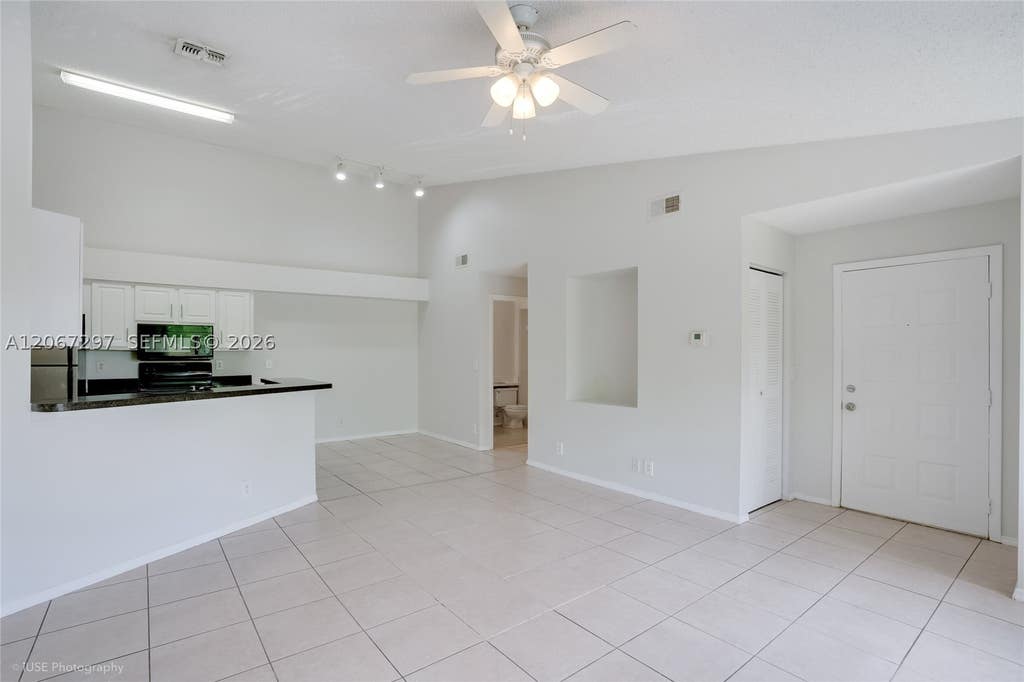 Photo of 9999 Summerbreeze Dr #409, Sunrise, FL 33322 (MLS # A12067297)
