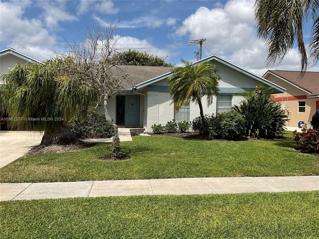 Photo of 1243 NW 11th St, Boynton Beach, FL 33426 (MLS # A11602377)