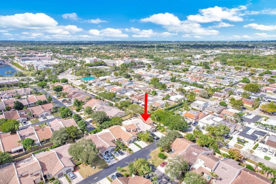 Family-oriented stable gated community, low monthly HOA. CORNER UNIT. FULLY REMODELED, 3bed (plus office)/2 bath with ample living/dining/family area, marble flooring throughout house, skylight. Impact windows and shutters. NO neighbords at the back. Excellent Location with easy access to major roadways, malls (walk to Town & Country Mall), shopping, restaurants, schools. Ample Security, clubhouse, pool, tennis courts, gym, landscaped grounds.