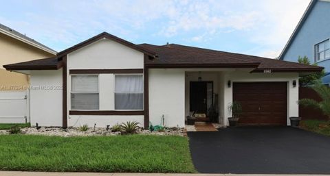 Photo of 9740 SW 13th St, Pembroke Pines, FL 33025 (MLS # A11877534)