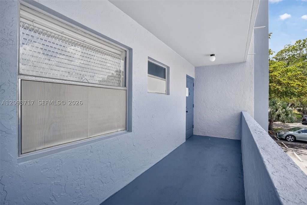Photo of 8390 Sands Point Blvd #F210, Tamarac, FL 33321 (MLS # A12093717)