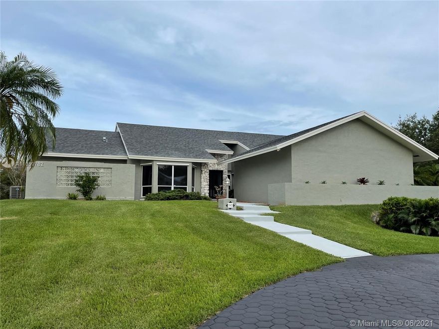 Elegant Palmetto Bay Home waiting for the perfect family. 4 bedrooms and three renovated baths. Back yard has access to Bill Sadowski Park...a child's dream of fun and an adult's serene paradise. Cul de Sac for safety and privacy. Spacious rooms and lots of storage. New roof 2018, three AC units replaced in 2018, 2019, & 2021=9.5 tons. Impact front door/accordion shutters and panels for windows and French doors. Sprinkler system on well. Pool pump replaced in 2017 and pool resurfaced during summer of 2020. Garage door replaced 2016. Screened pool area. Excellent area. Bring your pickiest buyer...they will be impressed.