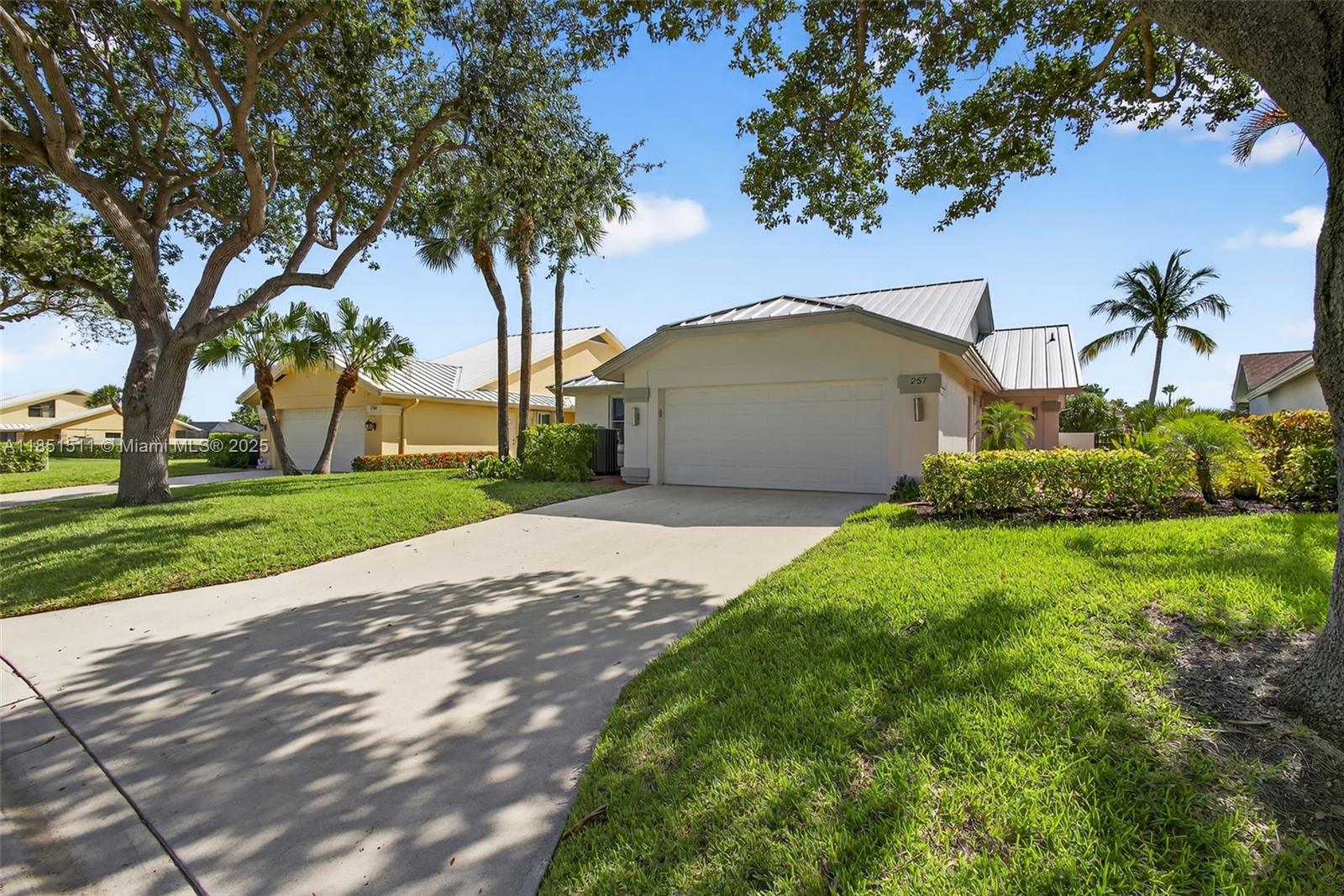 Live among the highest elevations in Palm Beach County with this renovated home, offering a perfect blend of style and coastal living. A short stroll takes you to the stunning Jupiter and Juno Beaches, while your backyard opens up to the serene Jupiter Ridge Nature Preserve. This home is more than just a place to live; it's a lifestyle. The open-concept layout and vaulted ceilings provide a spacious, airy feel, complemented by a renovated kitchen, bathrooms, and laundry room. Enjoy peace of mind with a new 2025 metal roof and impact windows and doors. As a resident of The Ridge at the Bluffs, you'll have access to a lap pool, tennis and pickleball courts, and the Bluffs Intracoastal Dog Park. This is your chance to own a luxurious home in one of Jupiter's most desirable locations.