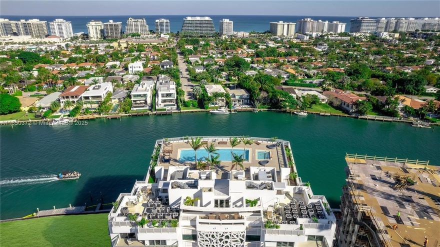 MOVE-IN-READY RESIDENCE WITH SIDE WATER VIEWS, located in The Ivory, a newer contemporary building in the PRESTIGIOUS BAY HARBOR ISLANDS. 2 ASSIGNED PARKING SPACES—rare in the island—and a LARGE STORAGE conveniently located in front of the unit. Freshly painted with premium ceramic floors, this unit has lots of natural light. Enjoy BREATHTAKING VIEWS FROM THE ROOFTOP POOL! This 2-bedroom plus large den with window (converted to 3rd bedroom) offers 1,305 sq ft of living space and nearly 400 sq ft of balconies. Nestled in one of Miami's most desirable areas, with a A-rated school (RUTH K BROAD K-8), and close to Bal Harbour, Indian Creek, and just minutes from the beach, Bal Harbour Shops, and top restaurants.