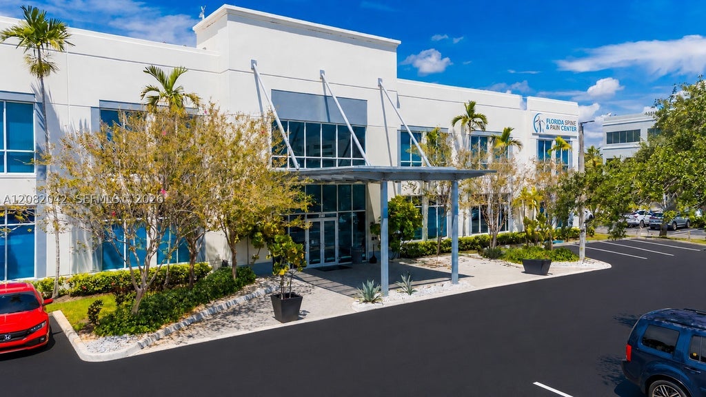 Photo of 2010 NW 150th Ave #210, Pembroke Pines, FL 33028 (MLS # A12082042)