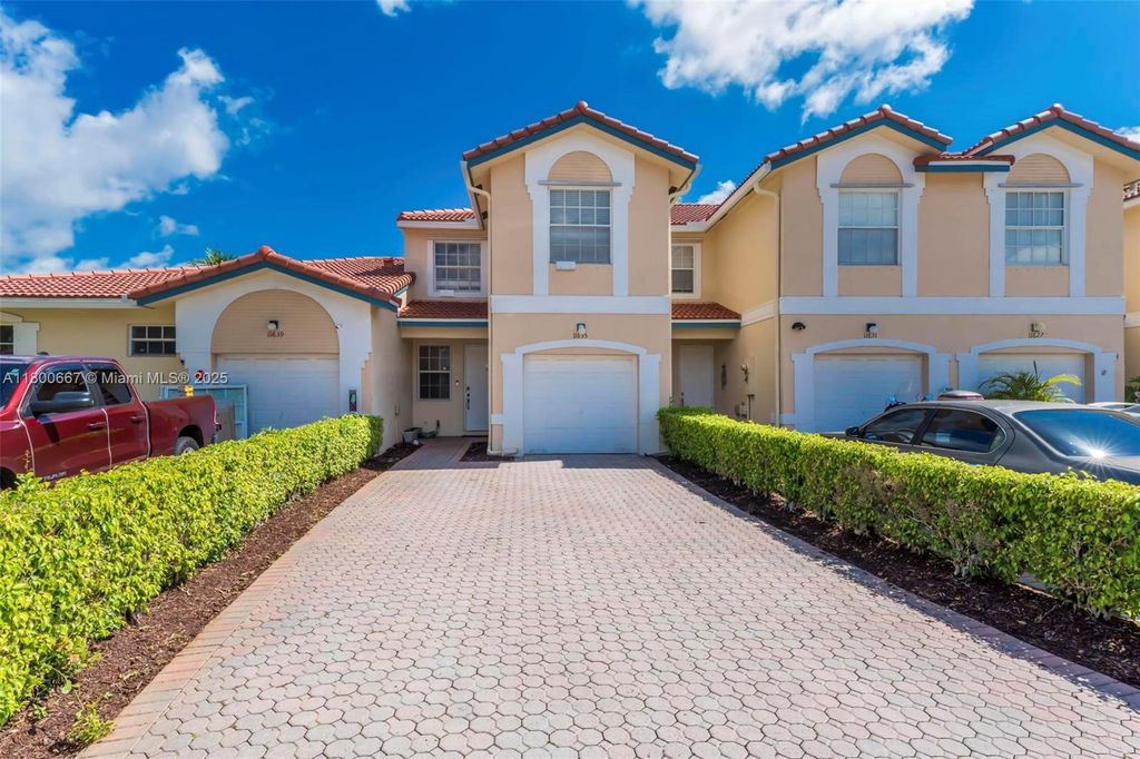 Photo of 11635 NW 47th Ct, Coral Springs, FL 33076 (MLS # A11800667)