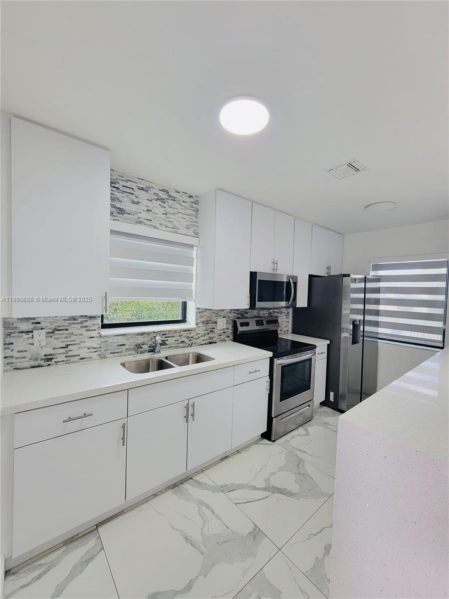CORAL WAY VILLAGE SEC A P - Residential Lease