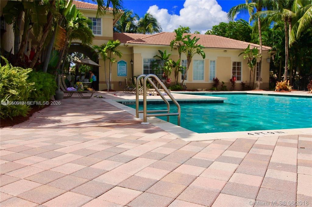 Photo of 2458 Centergate Dr #202, Miramar, FL 33025 (MLS # A11950013)