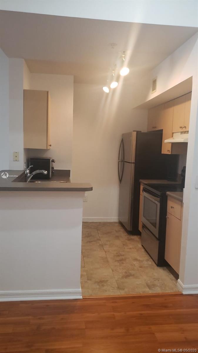Nice 1/1 unit with wood floor, stainless steel appliances & balcony.NO CONDO APPLICATION. Gated community with great amenities. Centrally located in Miramar.