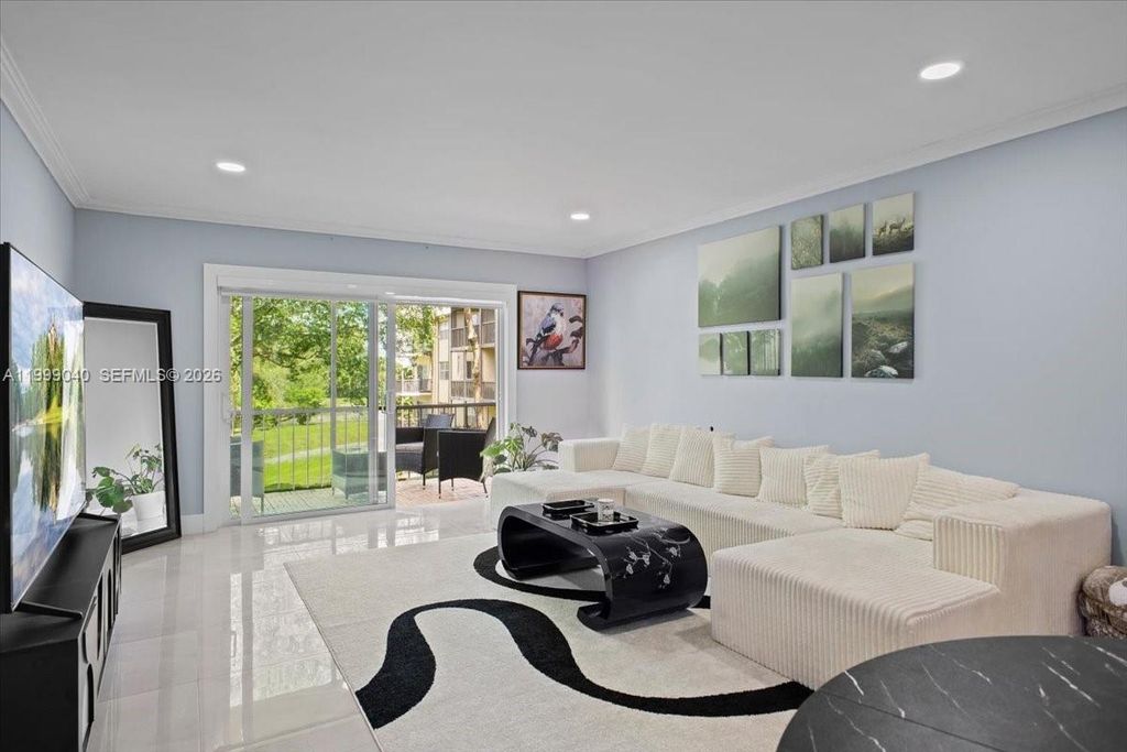 Photo of 6001 N Falls Cir Dr #310, Lauderhill, FL 33319 (MLS # A11999040)